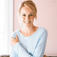 Woman smiling indoors