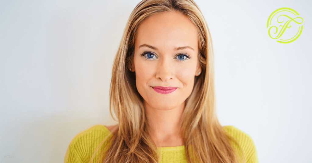 Woman smiling in yellow dress